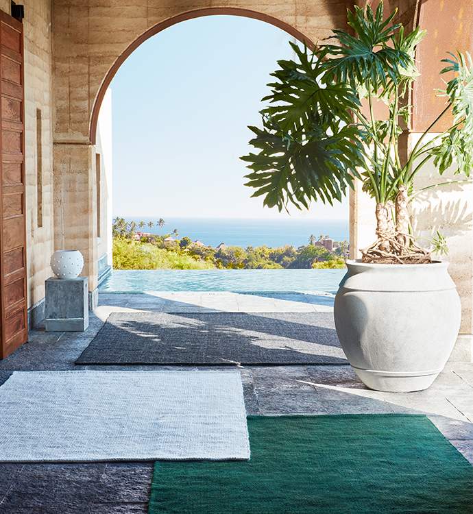Outdoor Patios With Large Rugs Covered