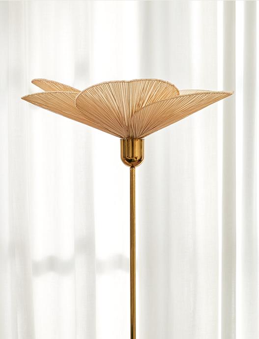 close up of Emile Rattan and Polished Brass Floor Lamp