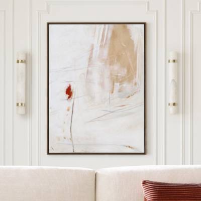 Painting hanging over sofa on wall