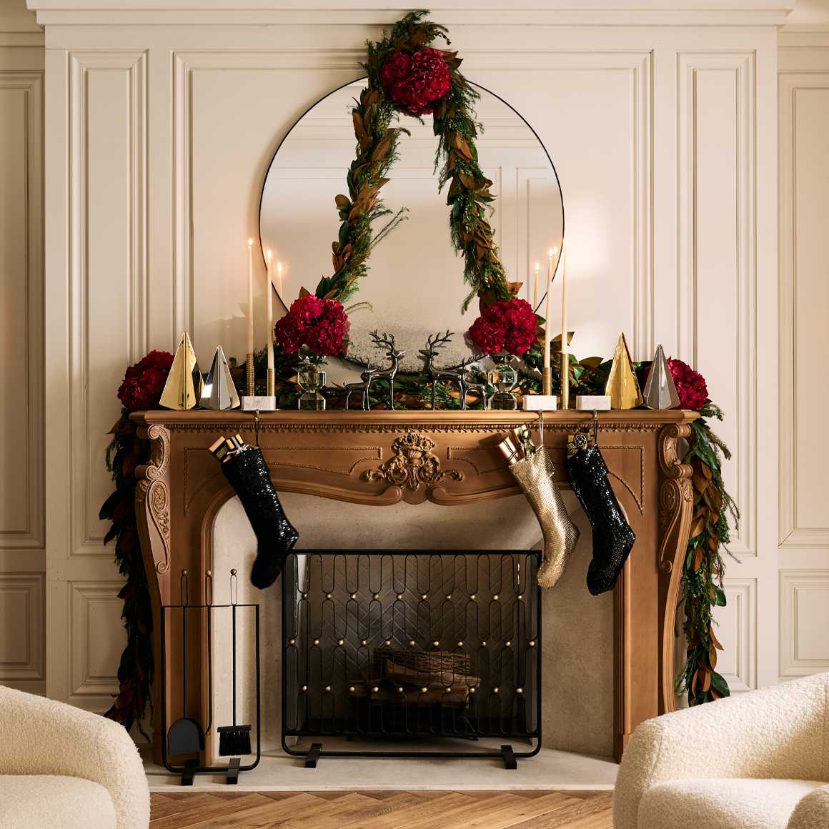 Christmas Decorations and Garnish draped over fireplace mantle in modern living room