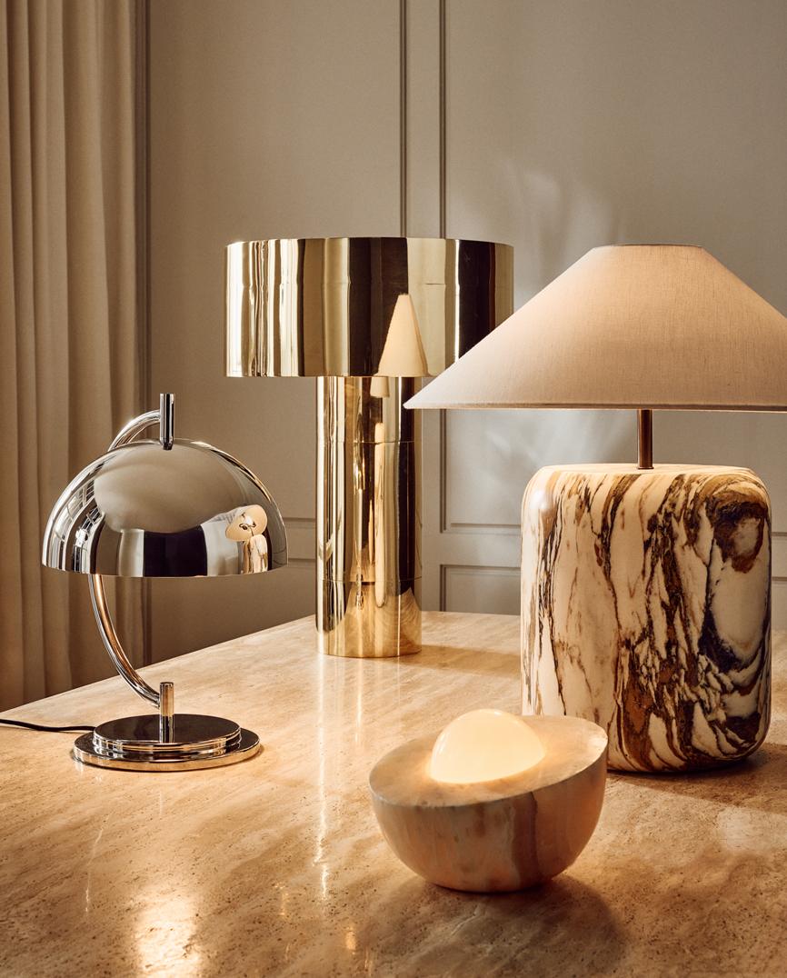 4 modern table lamps displayed on table