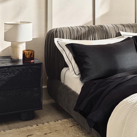 Modern Black bed with black and white bedding