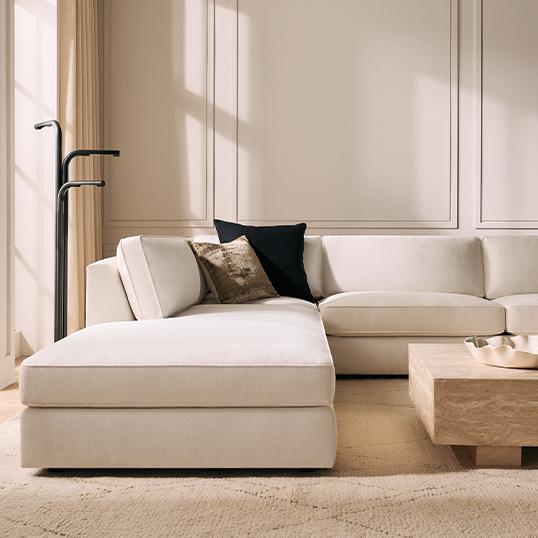 Modern white L-Shaped sectional in Living Room around coffee table