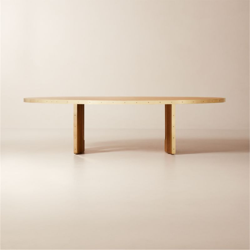 Albertine 110" Oval Oak Wood and Unlacquered Brass Dining Table by goop - image 0 of 11