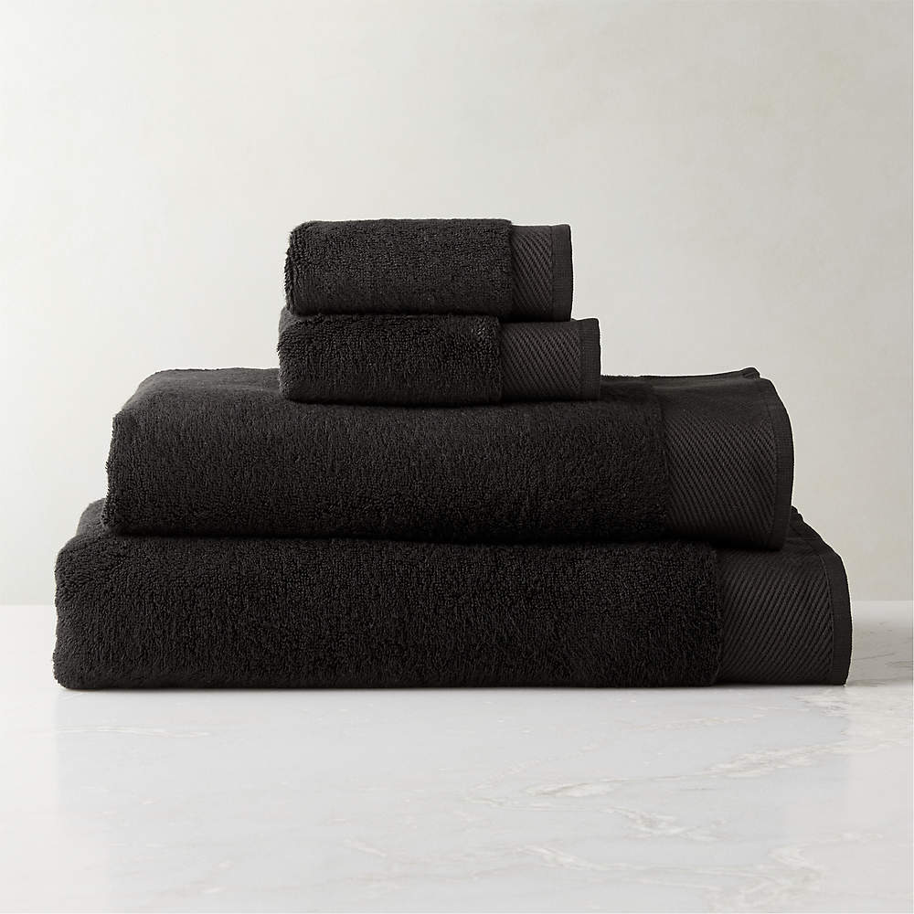 https://cb2.scene7.com/is/image/CB2/ArlowBlkOrgCttnBathGroupFHS23/$web_pdp_main_carousel_sm$/220915135953/arlow-organic-cotton-black-bath-towels.jpg