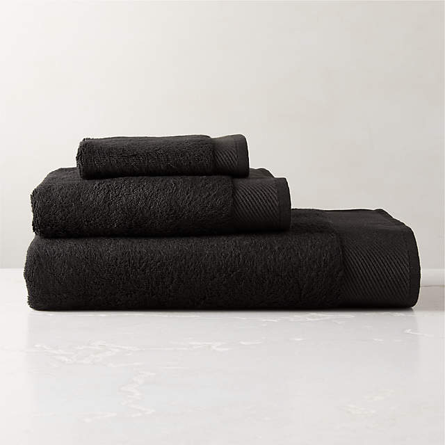 https://cb2.scene7.com/is/image/CB2/ArlowBlkOrgCttnBthTwlBndSHS23/$web_pdp_main_carousel_zoom_xs$/221227170017/arlow-organic-cotton-black-bath-towel-set.jpg