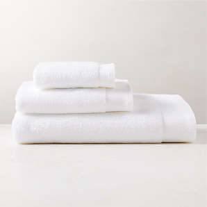 https://cb2.scene7.com/is/image/CB2/ArlowWhtOrgCttnBthTwlBndSHS23/$web_plp_card_mobile$/221227170016/arlow-organic-cotton-white-bath-towel-set.jpg