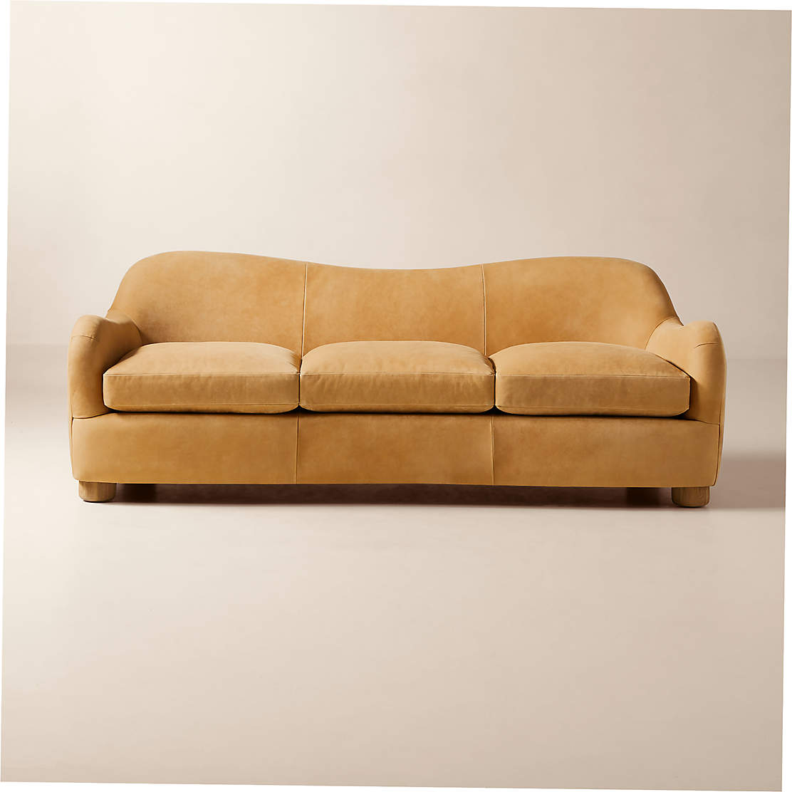 Bacio Caramel Brown Leather Chair by Ross Cassidy CB2