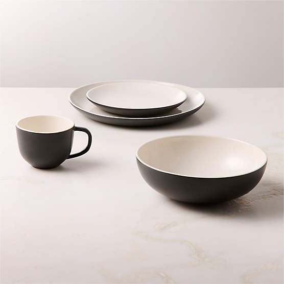 Barchan 4-Piece Black and Warm White Stoneware Dinnerware Set by Kravitz Design