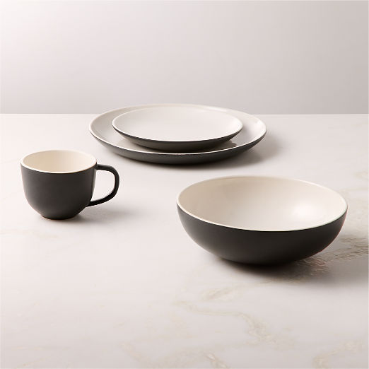 Barchan 4-Piece Black and Warm White Stoneware Dinnerware Set by Kravitz Design