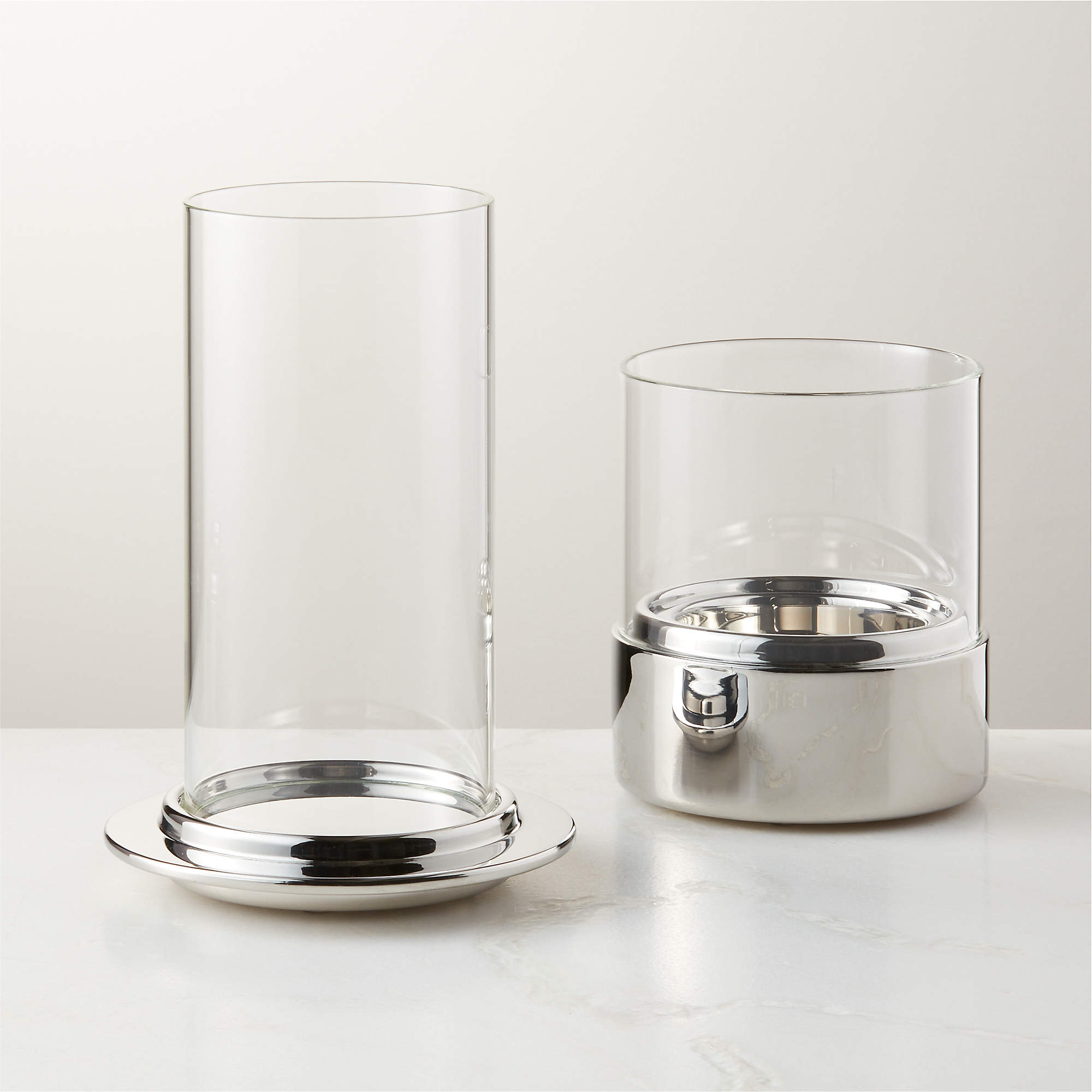 Alta and Bassa Stainless Steel Hurricane Candle Holders CB2