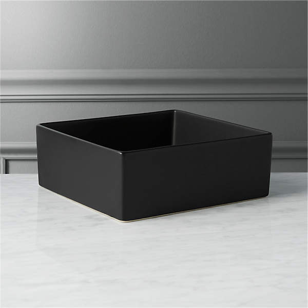 https://cb2.scene7.com/is/image/CB2/BentoMatteBlkServingBowlSHF16/$web_pdp_main_carousel_xs$/190905021640/bento-matte-black-square-bowl.jpg