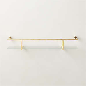 https://cb2.scene7.com/is/image/CB2/BlaineUldBsWllShlfWR24inSHF22/$web_plp_card_mobile$/220411092026/blaine-polished-brass-wall-shelf-with-rail-24.jpg