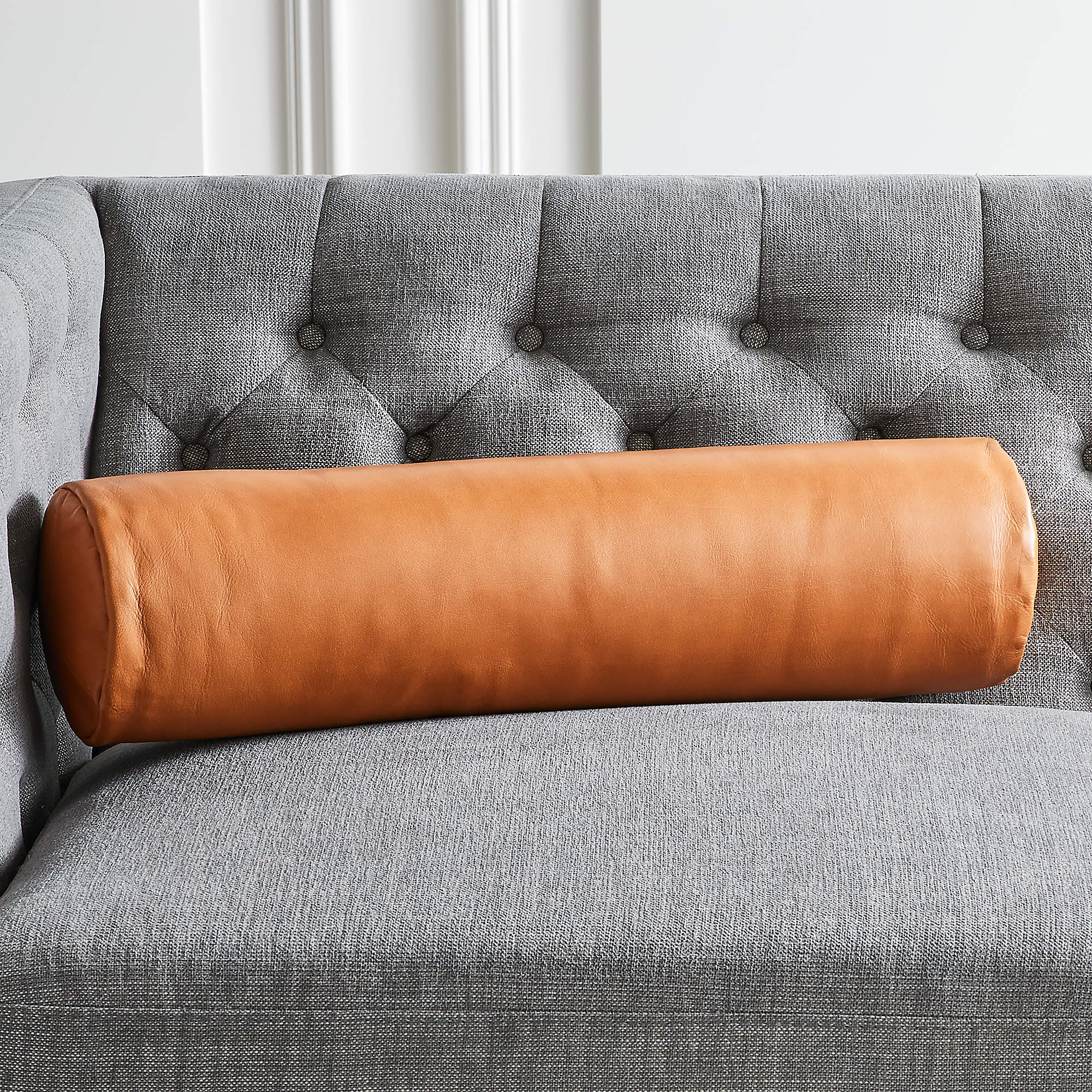 Shop Bolster brown leather pillow from CB2 on Openhaus