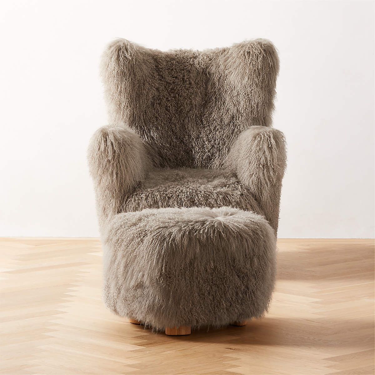 Bozzi Dark Grey Mongolian Sheepskin Chair and Ottoman Set CB2