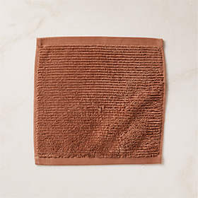 https://cb2.scene7.com/is/image/CB2/BrooksDstyRsOrgCttnWshCtSHF23/$web_recently_viewed_item_sm$/230512115019/brooks-ribbed-organic-cotton-dusty-rose-washcloth.jpg