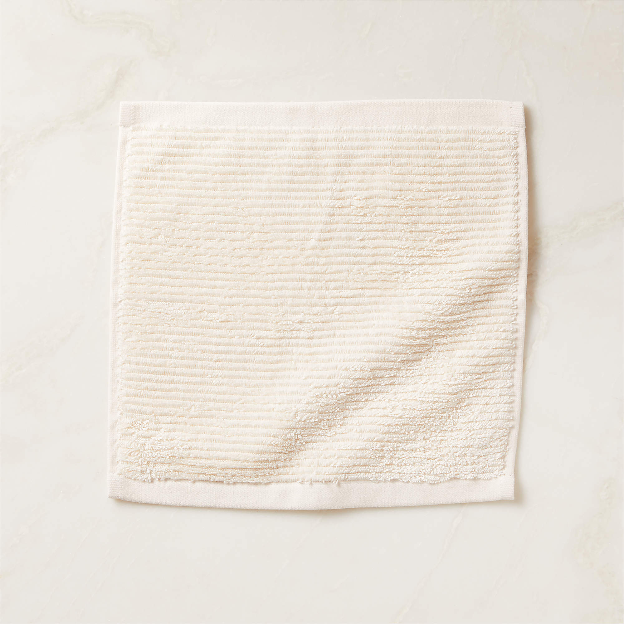 Brooks Ribbed Organic Cotton Warm White Washcloth + Reviews | CB2