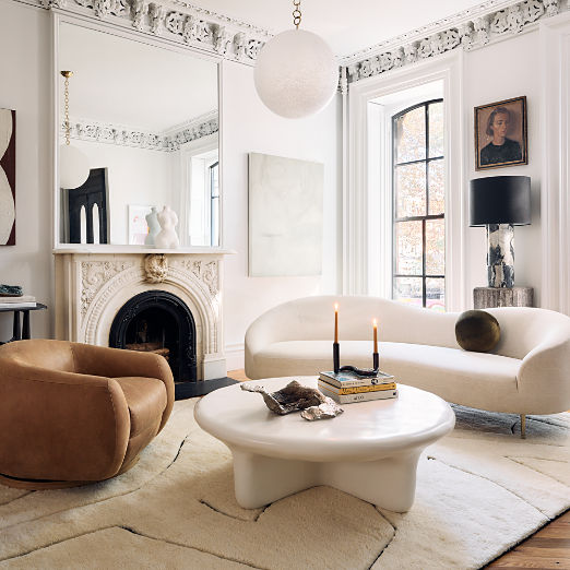 Bodene 50" Round Ivory Resin Coffee Table