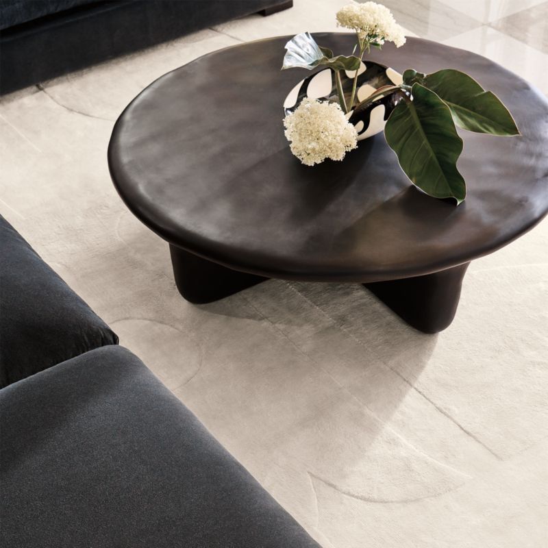 Bodene 50" Round Black Resin Coffee Table - image 4 of 9