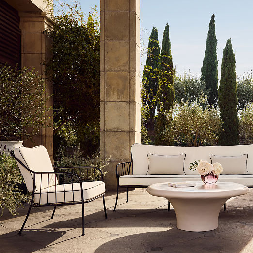 Welling Black Metal Outdoor Lounge Chair with White Cushions