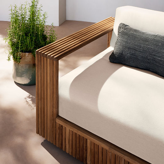 Topia 4-Piece Teak Outdoor Sectional Sofa and Ottoman with White Sunbrella® Cushions