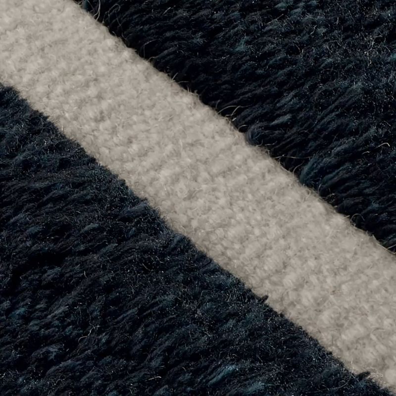 Play Copley Hand-Knotted Black with Warm White New Zealand Wool Area Rug 8'x10' - video 1 of 1