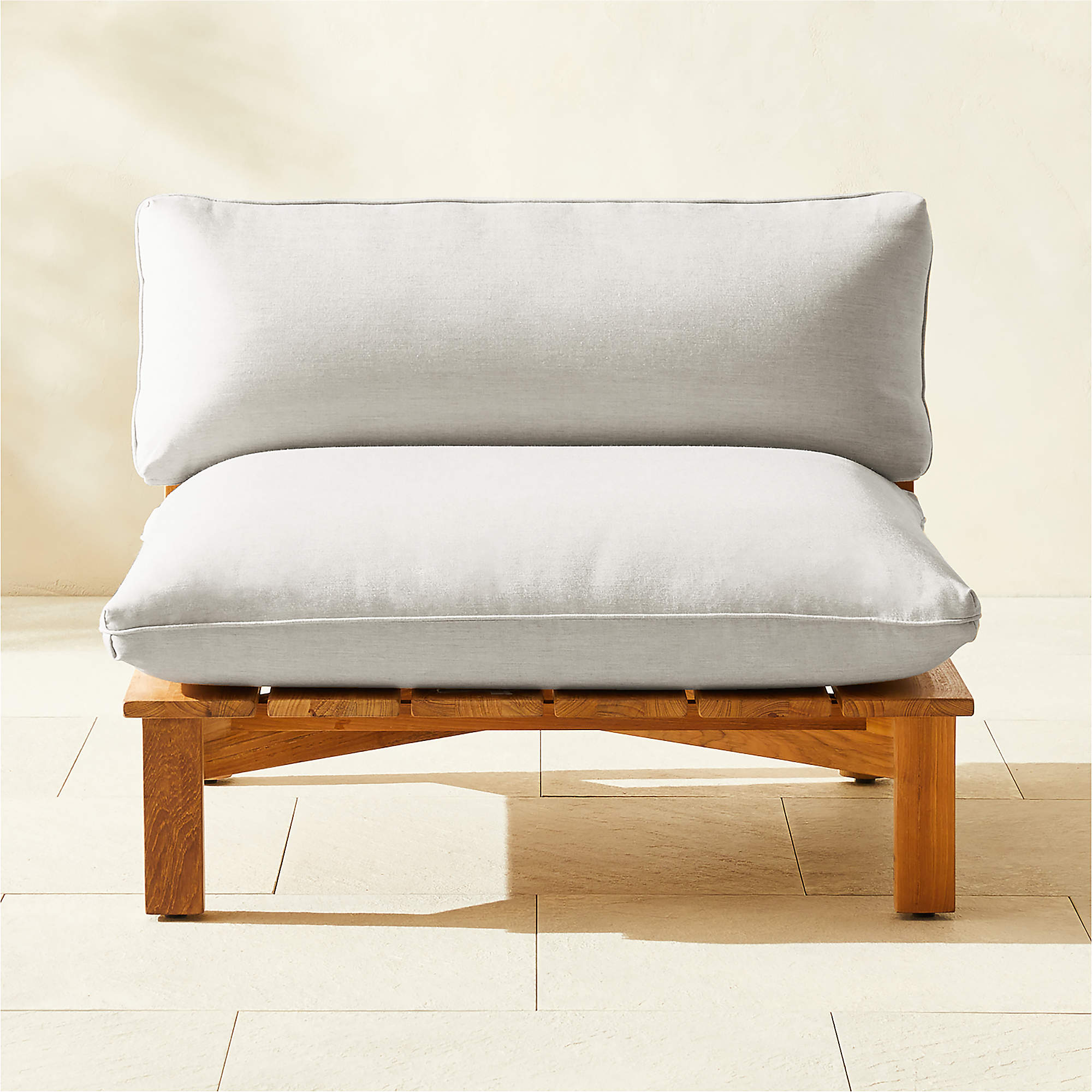 Cabra Teak Outdoor Armless Chair with Grey Sunbrella Cushions CB2 Canada