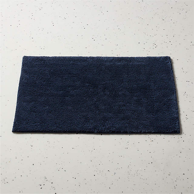 https://cb2.scene7.com/is/image/CB2/ChaseOrgCttnDpBlBathMatSHF22/$web_pdp_main_carousel_zoom_xs$/220607114038/chase-organic-cotton-midnight-blue-bath-mat-24x36.jpg