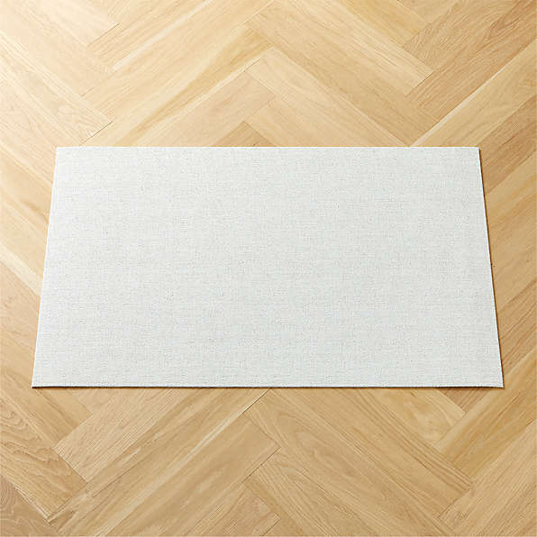 https://cb2.scene7.com/is/image/CB2/ChlwchBcMrhmlwFlrmt2x3SHF23/$web_plp_card_mobile_hires$/230320095027/chilewich-white-boucle-utility-mat-2x3.jpg