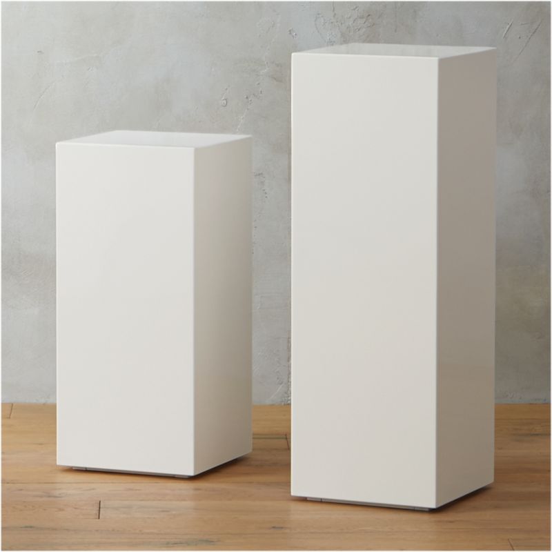 city slicker white pedestal tables | CB2