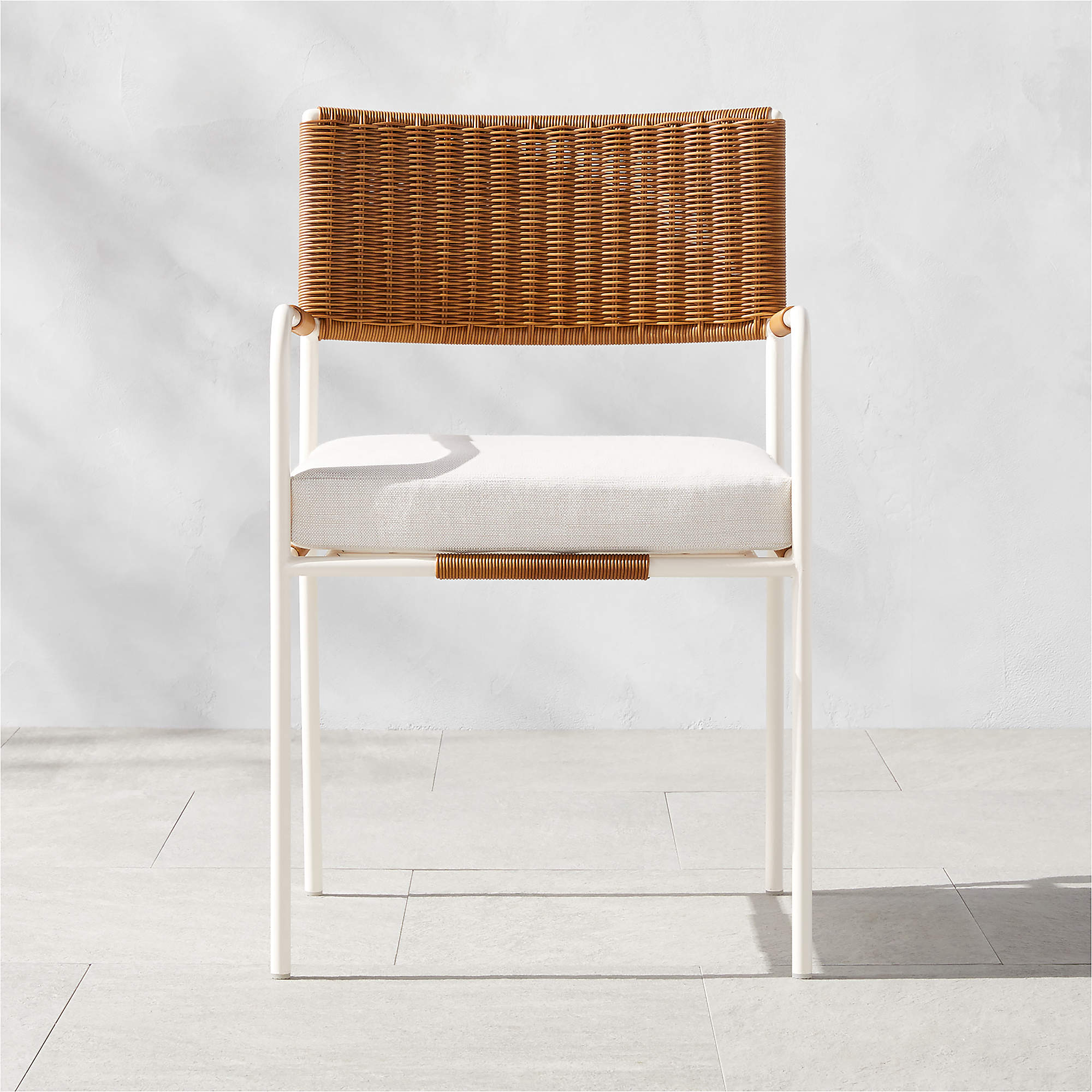 Colombe Modern White Metal And Rattan Outdoor Dining Armchair With White Sunbrella Cushion Cb2 6149