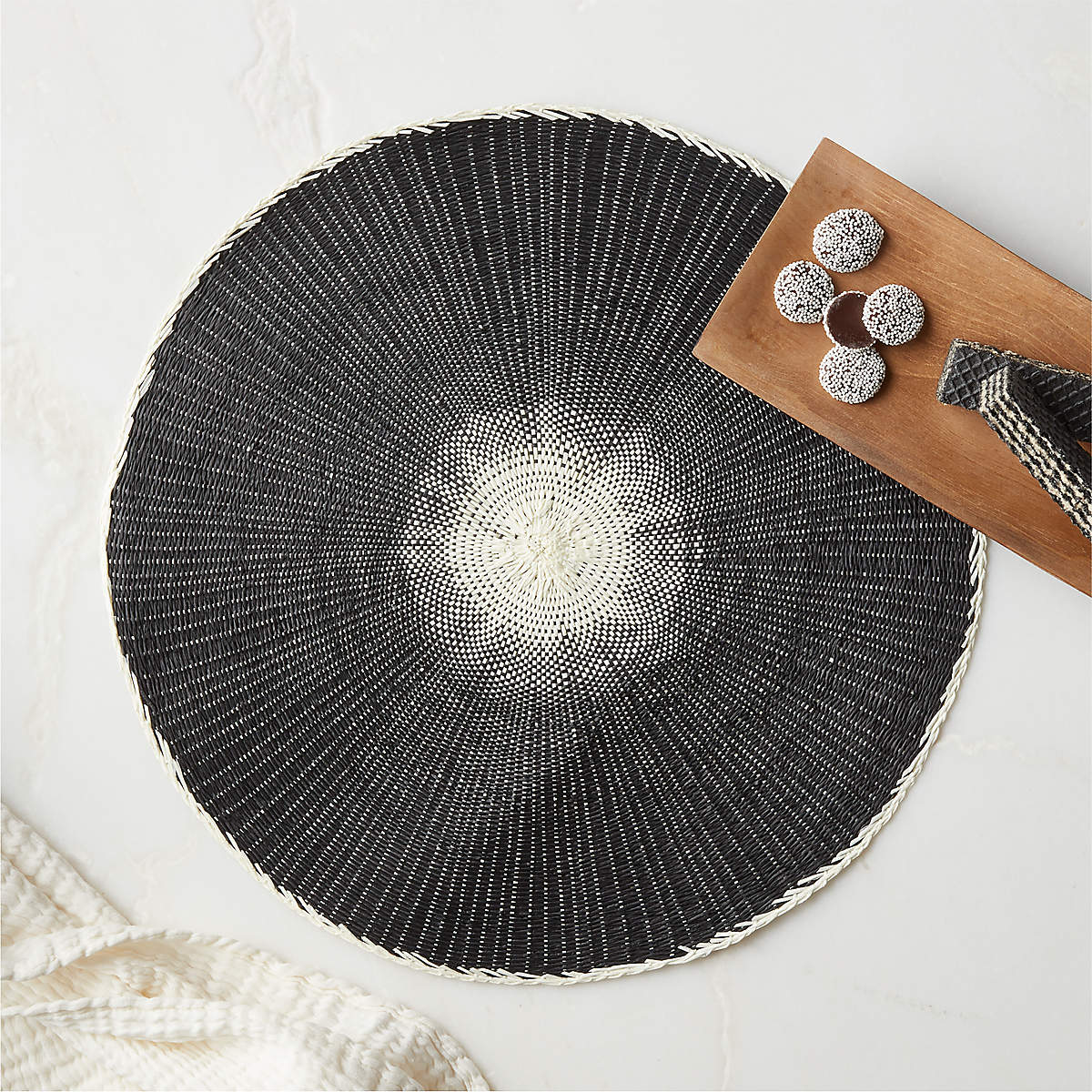 Emry Modern Woven Black Round Placemat + Reviews | CB2