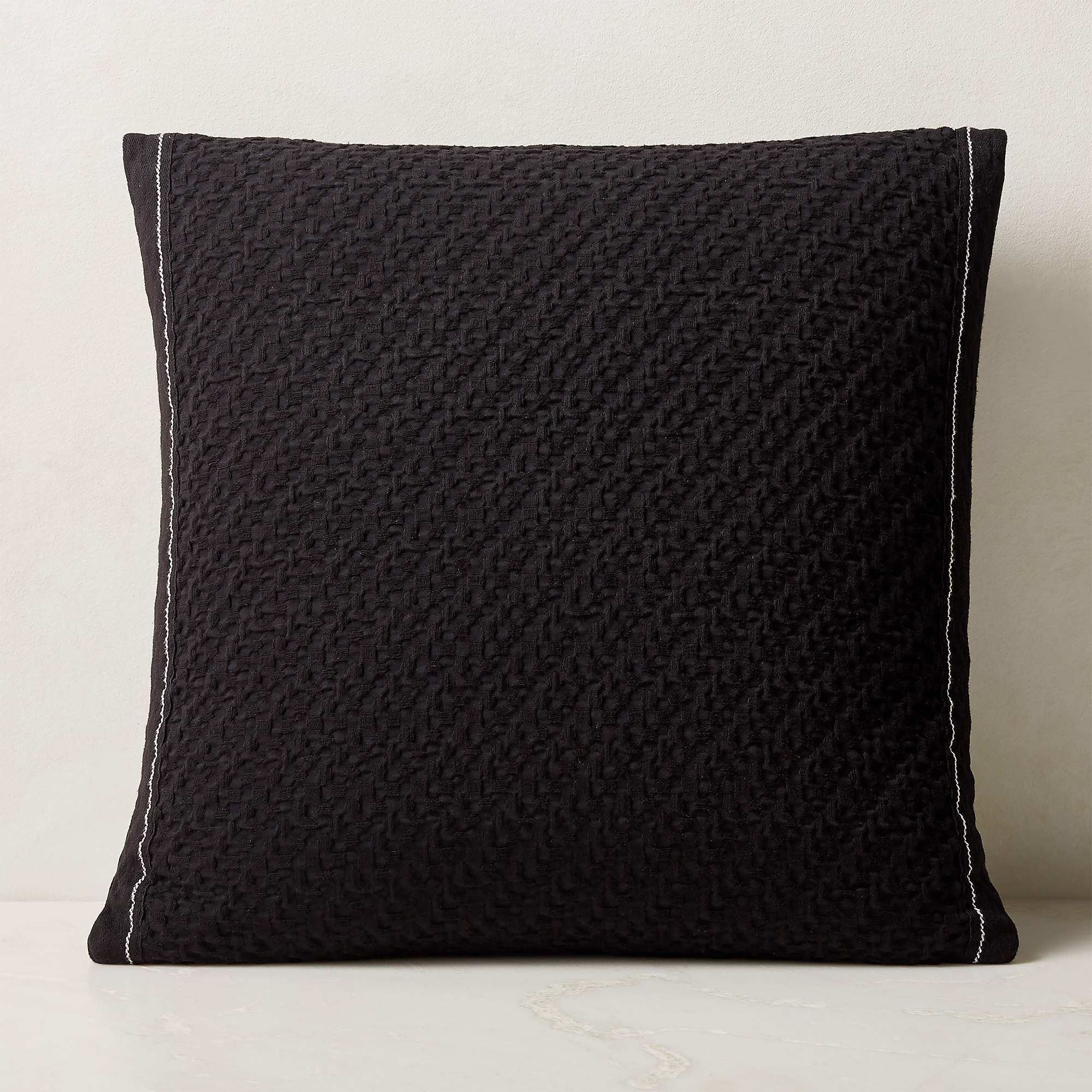 Evora Black Throw Pillow 23" CB2