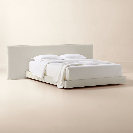 Facade Warm White Upholstered Extended Queen Bed