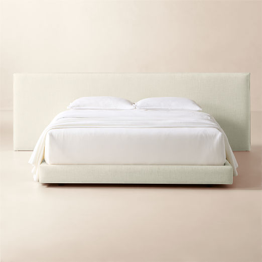 Facade Warm White Upholstered Extended Queen Bed
