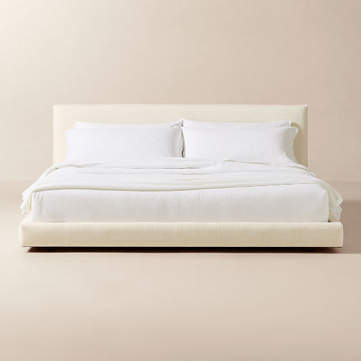 Facade Soft White Upholstered Queen Bed