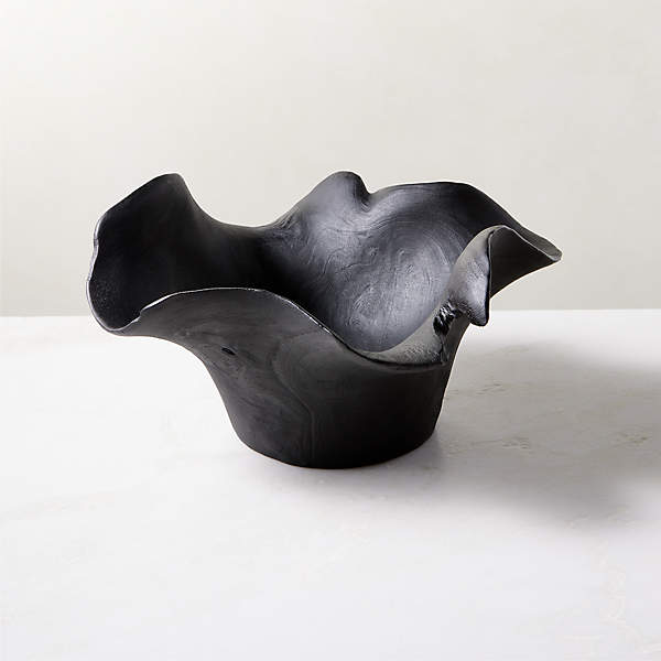 https://cb2.scene7.com/is/image/CB2/FlounceBlkndTeakBowlSHS23/$web_pdp_main_carousel_xs$/240215085013/flounce-black-teak-decorative-bowl.jpg