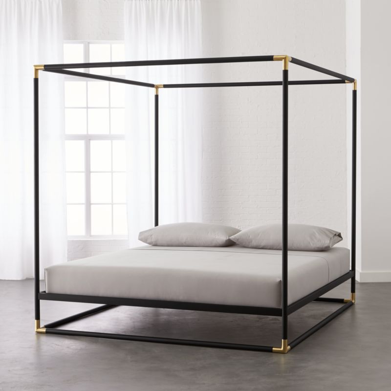 Black Wood Canopy Bed This bed gives you spacious storage without