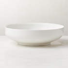 https://cb2.scene7.com/is/image/CB2/FretteOffWtServingBowlSHS23/$web_recently_viewed_item_xs$/221228141427/frette-off-white-serving-bowl.jpg