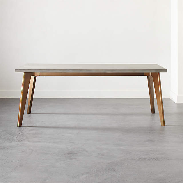 concrete and brass coffee table