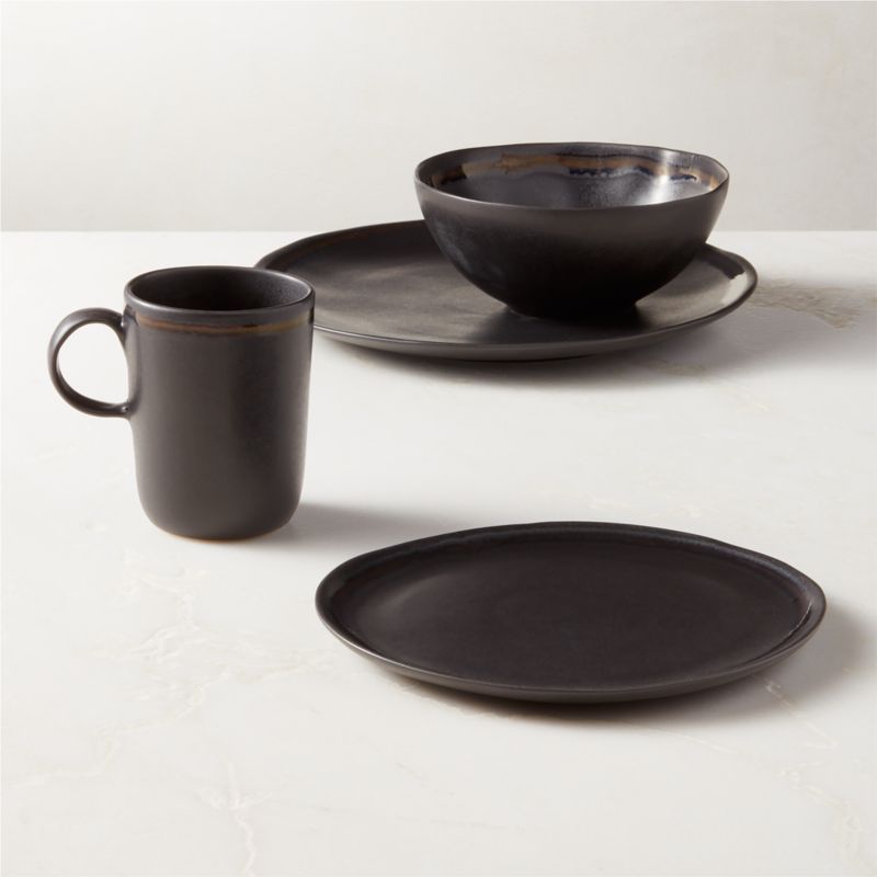 https://cb2.scene7.com/is/image/CB2/HyacinthBkRctRmd4PcStWSpBlSHF23/raw/230320095028/hyacinth-4-piece-black-dinnerware-set-with-soup-bowl-with-reactive-glaze.jpg