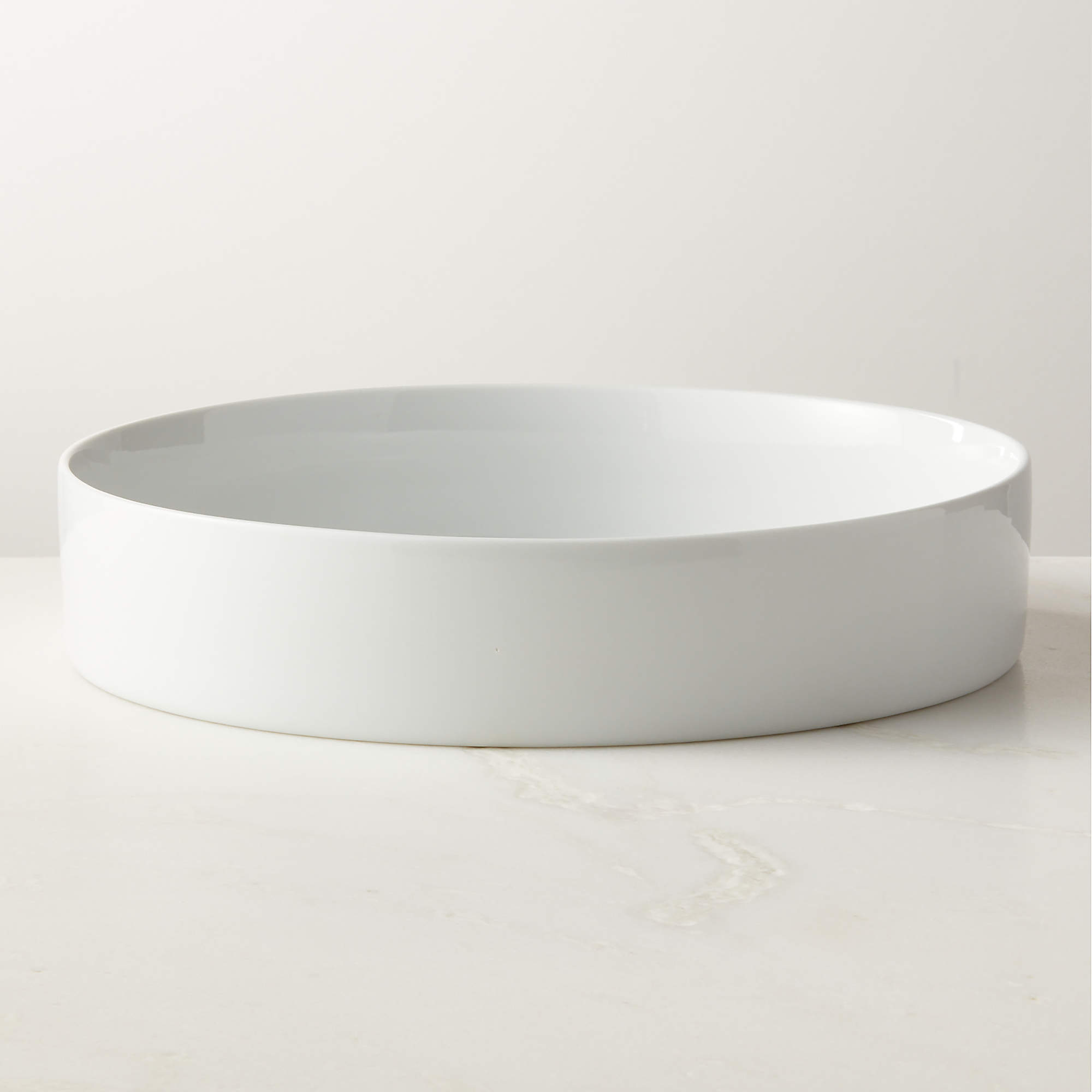 Inge Modern White Round Serving Bowl + Reviews CB2