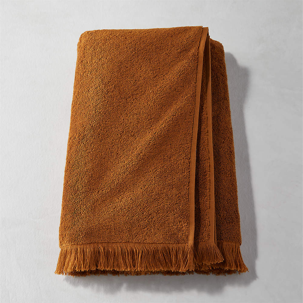 https://cb2.scene7.com/is/image/CB2/KDKindredOrgCtTwnyBathTwlSHF21/$web_pdp_main_carousel_sm$/210902143057/kindred-organic-cotton-tawny-bath-towel.jpg