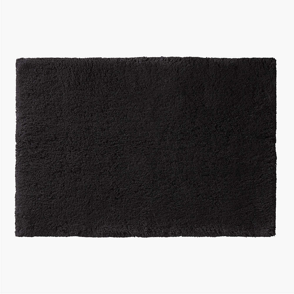 https://cb2.scene7.com/is/image/CB2/KalaniBlackBathMatSSF23/$web_pdp_main_carousel_sm$/230525094526/kalani-organic-cotton-black-bath-mat-24x36.jpg