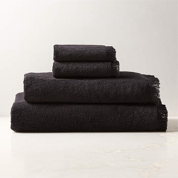 https://cb2.scene7.com/is/image/CB2/KamillaBkOgCtnCollectionFHF23/$web_pdp_main_carousel_xs$/230327152028/kindred-organic-cotton-black-bath-towels.jpg