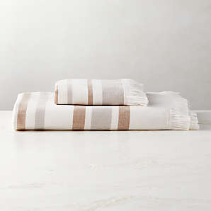 https://cb2.scene7.com/is/image/CB2/KamillaOrgCttnBathTowelGrpFHS23/$web_plp_card_mobile$/230206152820/kamilla-organic-cotton-striped-copper-bath-towels.jpg