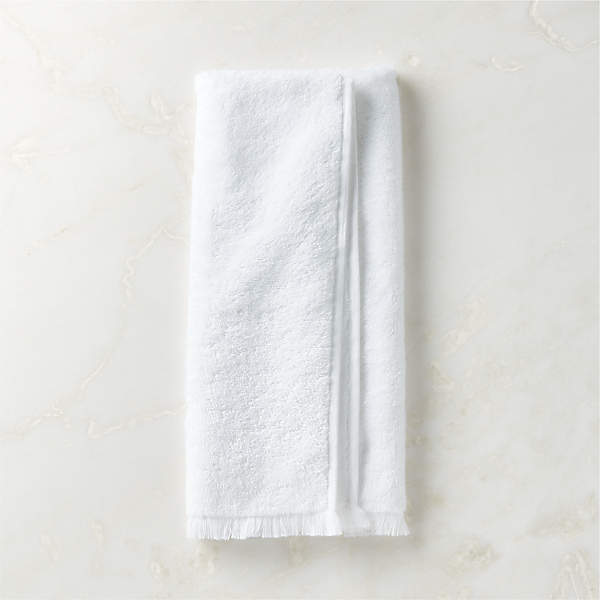 https://cb2.scene7.com/is/image/CB2/KindredWtOrgCttnHndTowelSHF23/$web_pdp_main_carousel_xs$/230605141024/kindred-organic-cotton-white-hand-towel.jpg