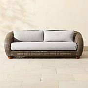 Maylin All-Weather Rattan Outdoor Sun Lounger with Warm White Sunbrella® Cushions