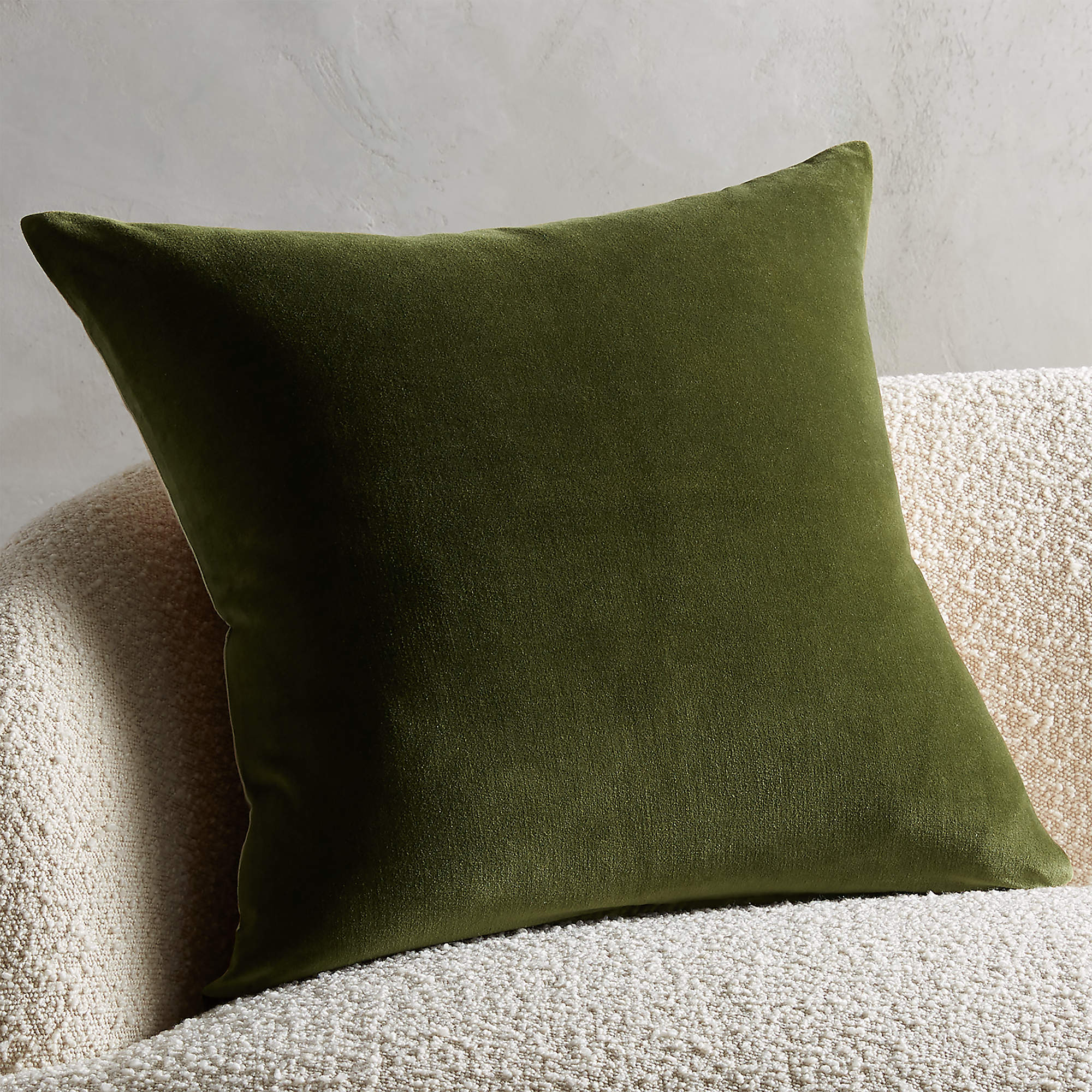 Shop 23" LEISURE OLIVE GREEN PILLOW WITH DOWN-ALTERNATIVE INSERT from CB2 on Openhaus