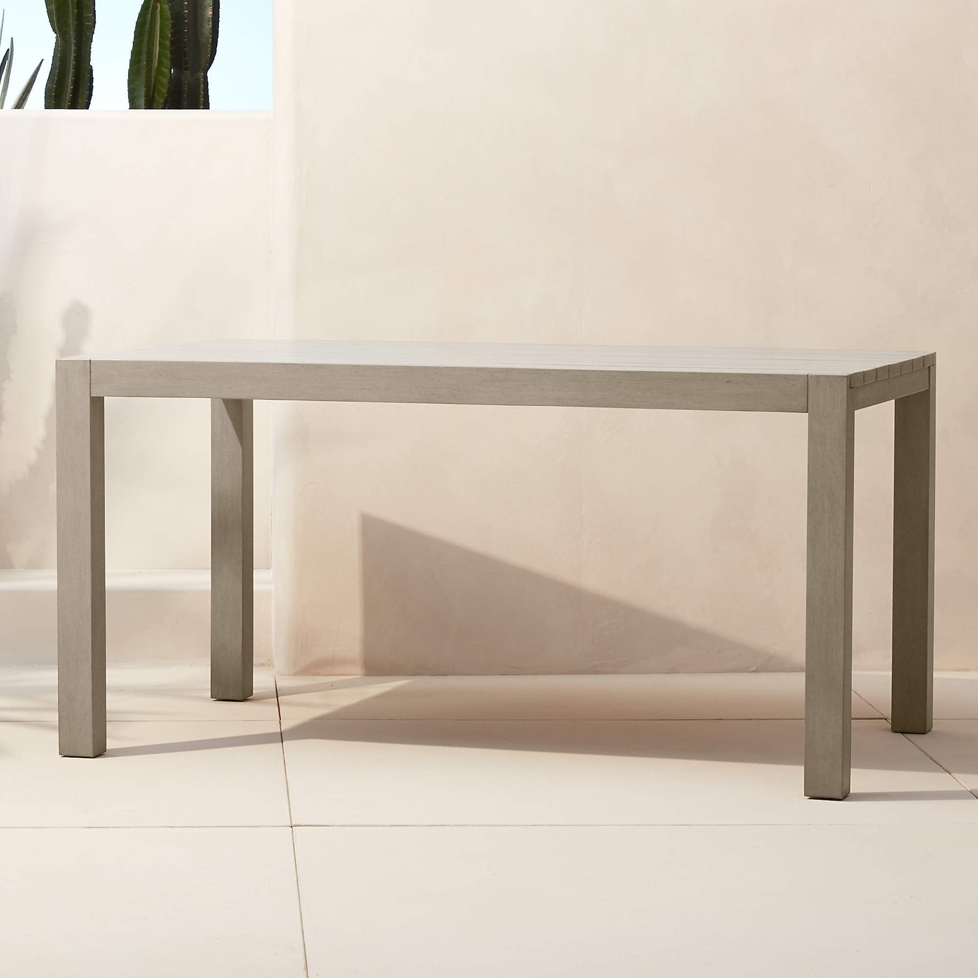 Matera Grey Outdoor Dining Table + Reviews CB2 Canada